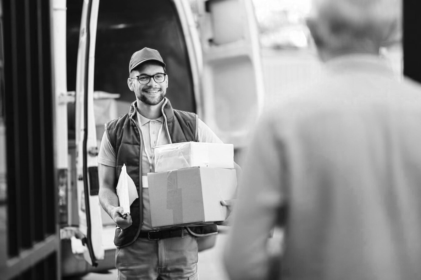 a building with a lot of plants in front of it